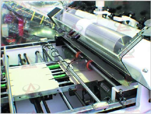 Bộ phận lên keo máy TC-1050H